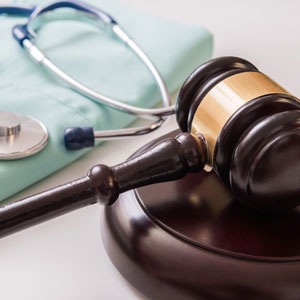 Stethoscope and gavel showcasing courtroom elements in Maryland personal injury cases.